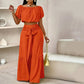 Zweiteiliges Set aus Off-Shoulder-Oberteil mit Puffärmeln und weiten Hosen – Elegant, bequem und perfekt für Sommertage ☀️
