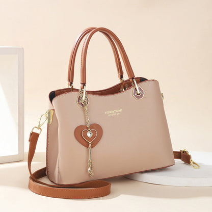 👜💟Elegante Damen-Tasche mit glänzendem Herzanhänger✨