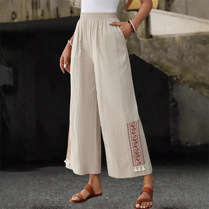 Damenhose mit elastischem Bund, weitem Bein und Quasten