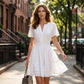 👗 NUR FÜR BEGRENZTE ZEIT: 50 % RABATT! ✨ Kurzärmeliges, gestuftes Minikleid für Damen – luftig, verspielt, perfekt für den Sommer 🌞